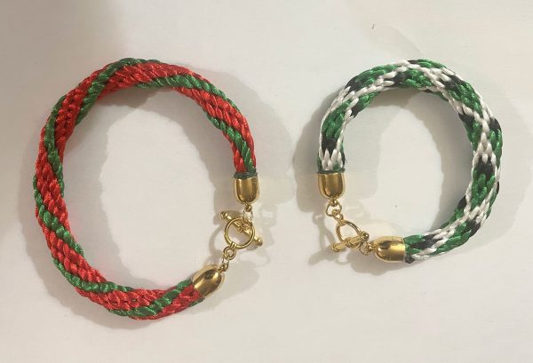 Picture of Kumhimo bracelets in Christmas colors.